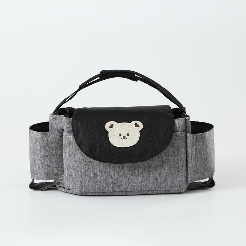 Borsa portaoggetti per animali dei cartoni animati Borsa per mummia multiuso a righe con stampa floreale Cesto appeso per carrozzina