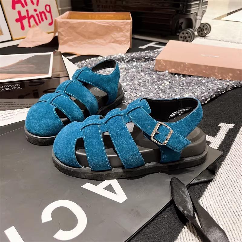 

European retro fashion big head shoes niche design candy bag head Roman sandals summer flat versatile pig cage shoes 42 синій