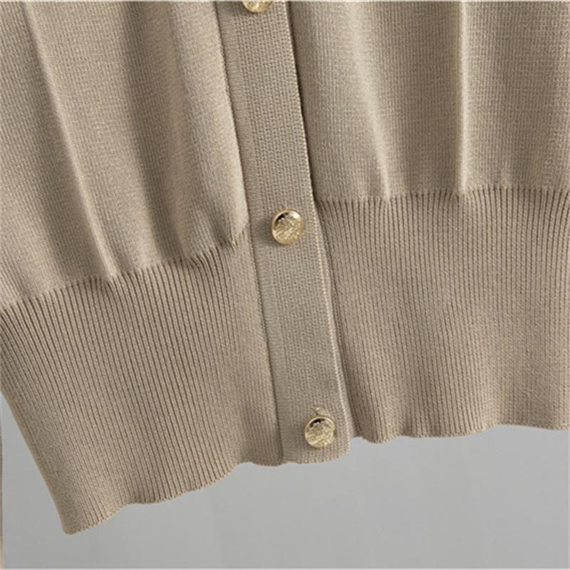 Women's autumn and winter slim fit knitted Suit New polo collar sweater hip hugging skirt two-piece set