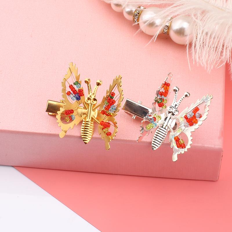 

Детский сплав Инкрустированная жемчужина будет двигать бабочку Шпилька Головной убор Корейская версия Девочка Лук Заколка для волос Модные аксессуары для волос