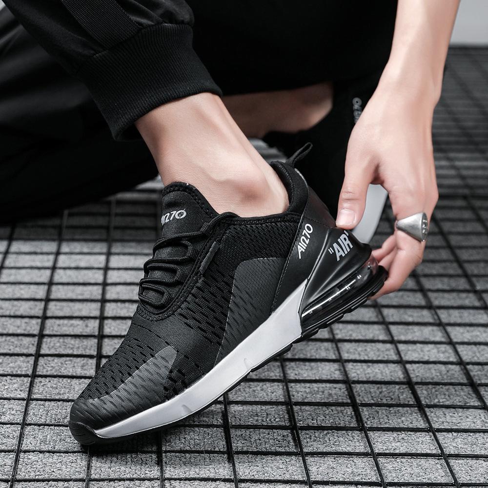 Couples spring and autumn trend versatile flying woven air cushion running breathable non-slip sports men's shoes