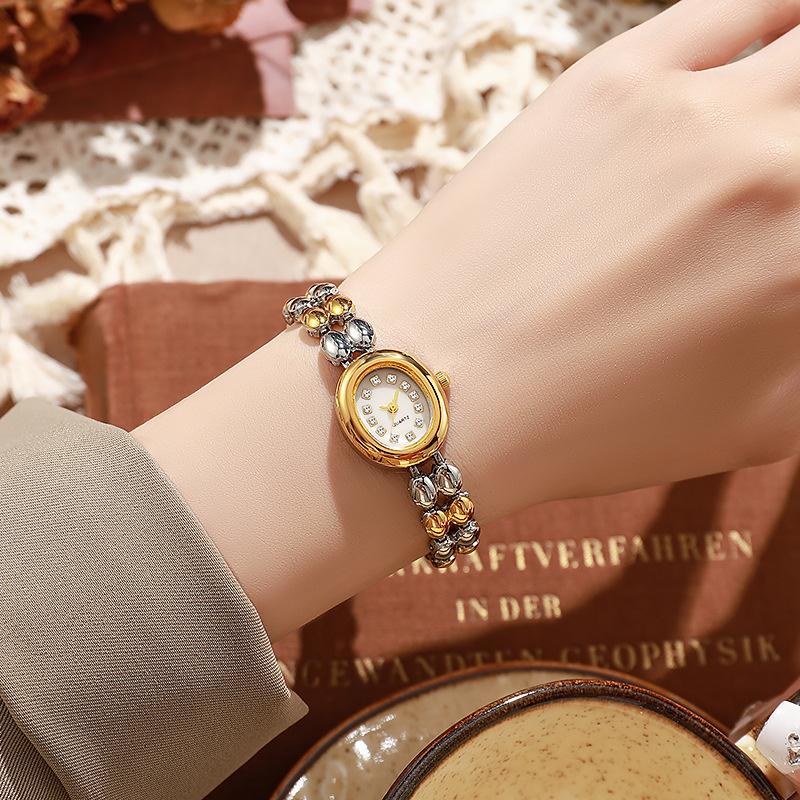 

Модный ретро браслет в форме капли воды, уникальный, компактный нишевый темперамент, градиентные многоцветные модные кварцевые часы