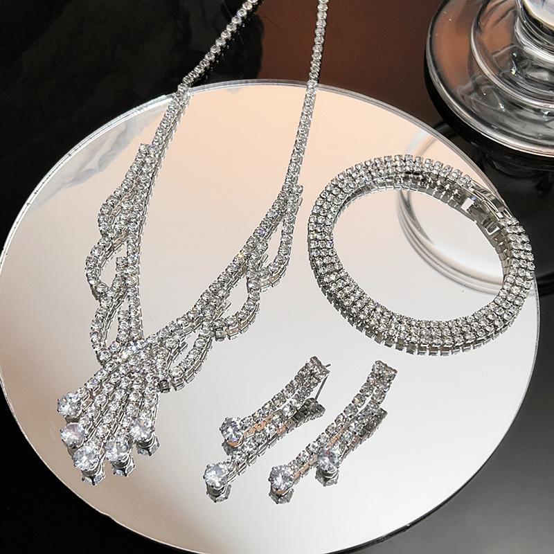 Meier Elegant necklace, bracelet, and earring set - bridal jewelry with full diamond accents