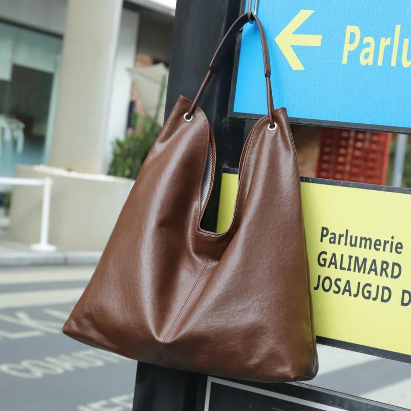 2025 Vegetable Tanned Cowhide Popular Large-capacity Tote Bag All-matching One-shoulder Class Armpit Commuter