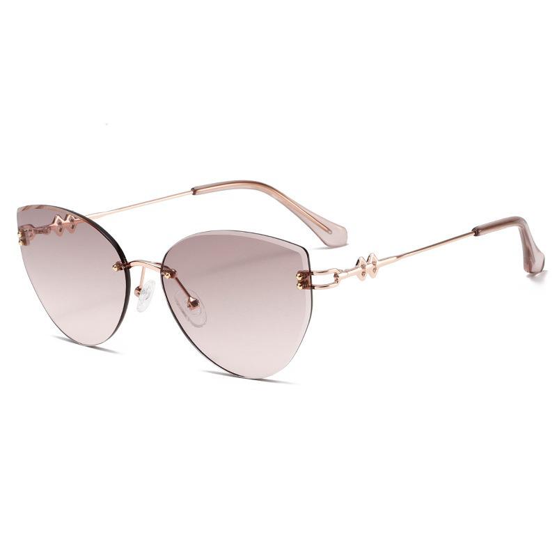 Women's Frameless Oval Metal Retro Sunglasses - High-End Japanese & Korean Fashion