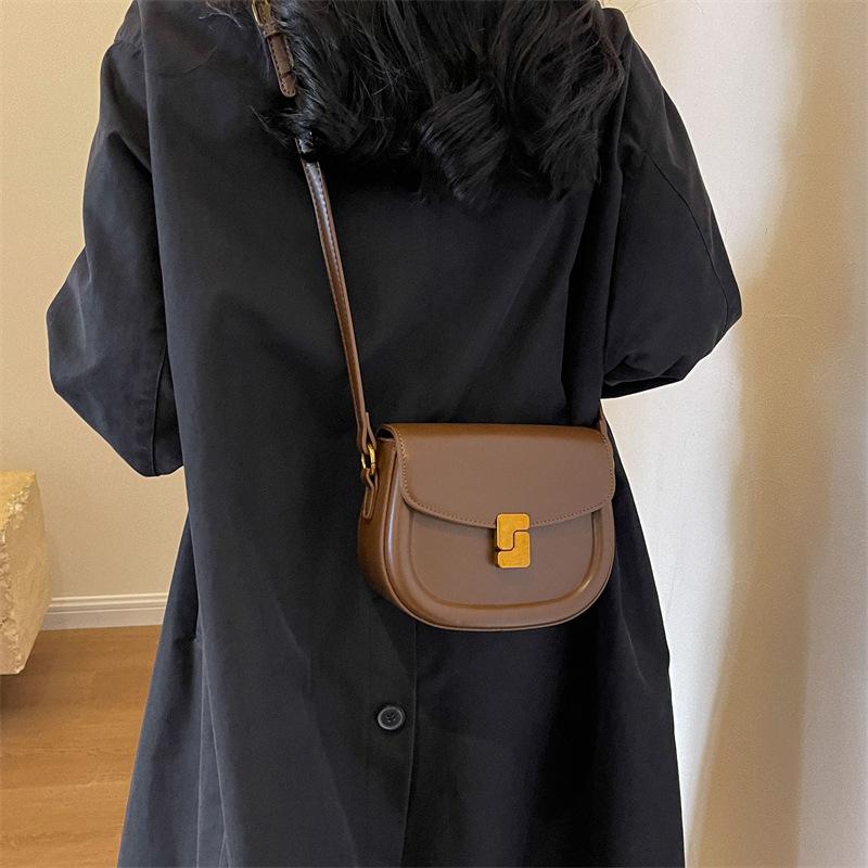 Korean popular high-end saddle bag fashion portable small bag women 2025 retro niche shoulder messenger bag