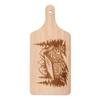 Wooden chopping board with an engraved mountain cottage