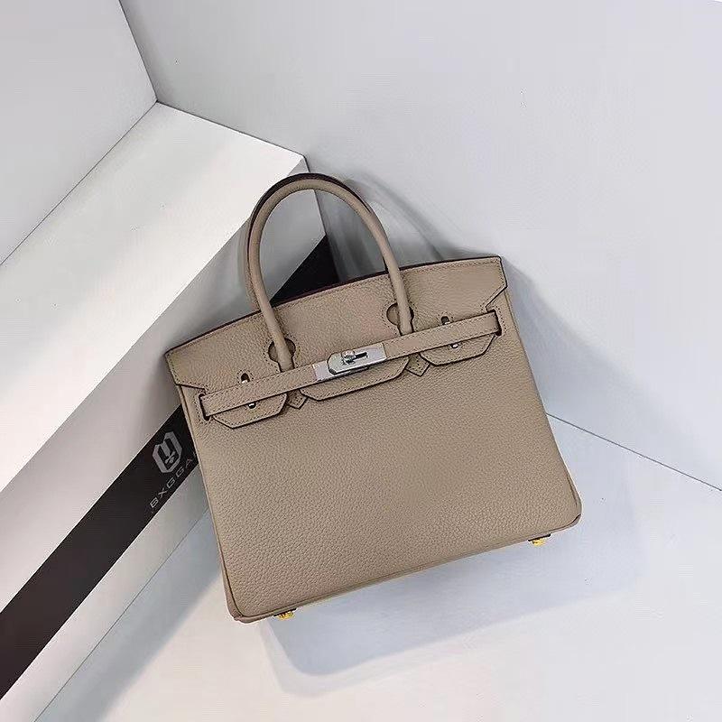 Mode erste Schicht Rindsleder Togo Platin Tasche Damen Silberne Schnalle High-End Handtasche Vielseitige Schulter Umhängetasche