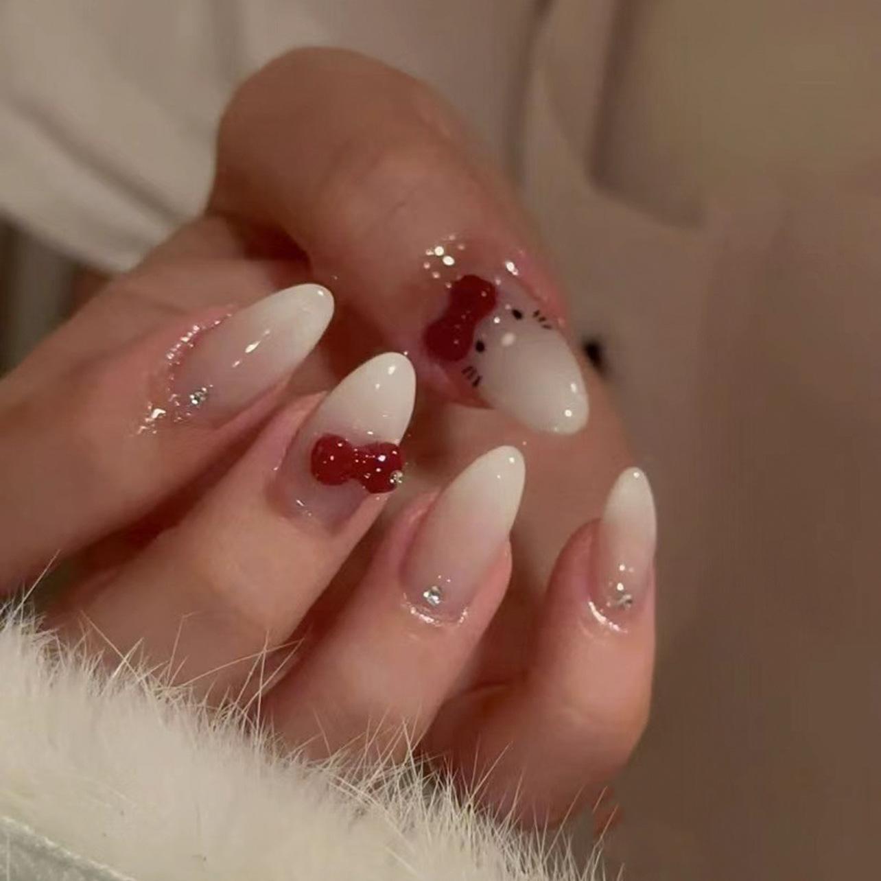 

Short almond nail art piece simple gradual change wearing fake nails sweet three-dimensional bow wearing nail