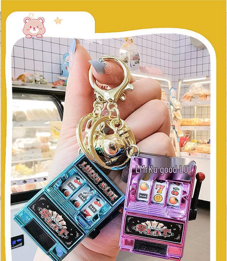 Gold-Plated Creative Tiger Fruit Machine Keychain Toy with Lottery Play Feature