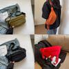 Versatile Water-resistant Canvas Crossbody Bag With Letter Print Perfect For Travel And Casual Use