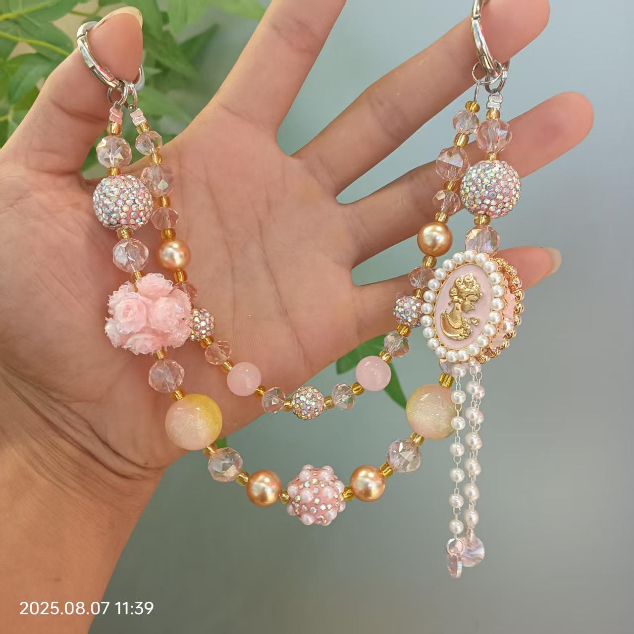 

High-End Color-Changing Beaded Phone Chain: Creative Scented Style with Double-Sided Tassel and Goddess Statue; Anti-Loss Pendant Phone Bag.