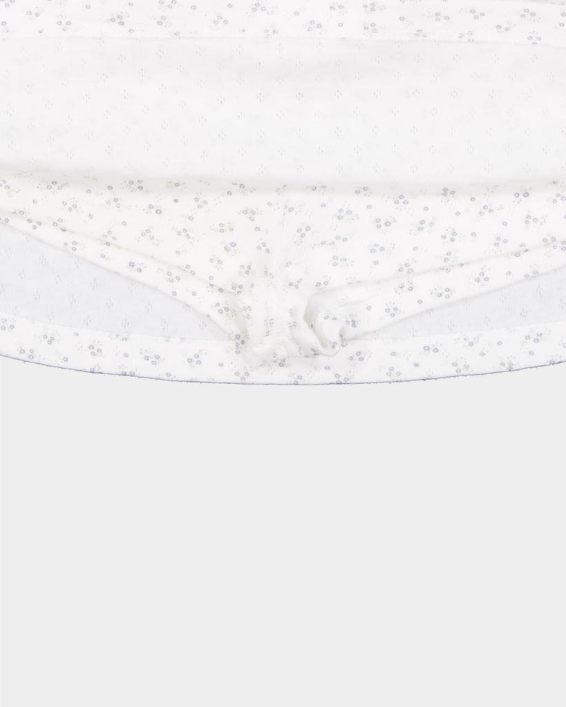 Dear Sis Floral Punching Mini Skirt (White)