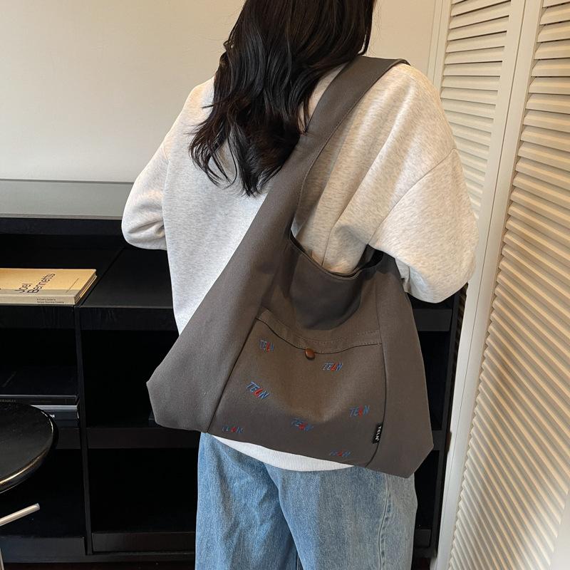 Canvas Bag Women's 2025 Autumn New Fashion Shoulder Bag Large Capacity Commuting Korean Niche Design Underarm Bag