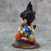 9cm Dragon Ball Kawaii Figur Kindheit Son Goku Hält Puaru Actionfiguren Anime Modell Puppe Sammlung Schreibtisch Dekoration Spielzeug