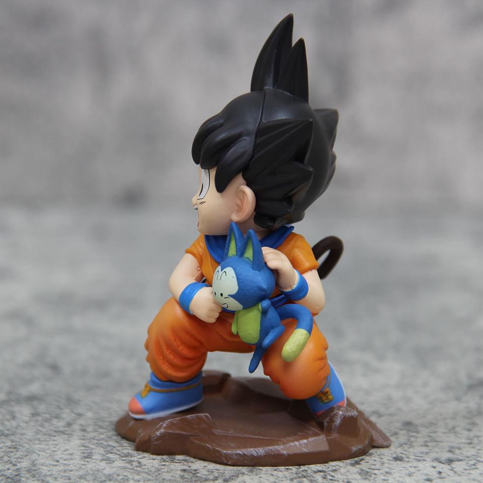 9cm Dragon Ball Kawaii Figur Kindheit Son Goku Hält Puaru Actionfiguren Anime Modell Puppe Sammlung Schreibtisch Dekoration Spielzeug
