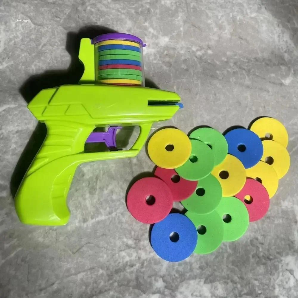 Non-Toxic Mini Carrot Flying Disc Launcher Toy Gun Eva Battle Outdoor Multi Person Sports Soft Bullet Gun Safety Carrot Flying Saucer Gun