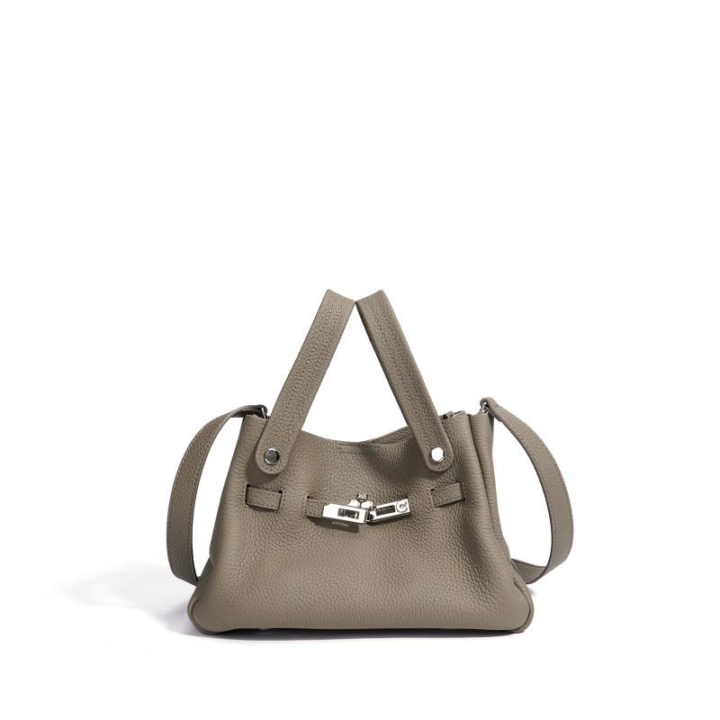 

Top Layer Cowhide Leather Bag Female Niche Design Vegetable Basket Water Bucket Commuting Handbag Crossbody Manufacturer bottom length 26, width 15, height 17CM