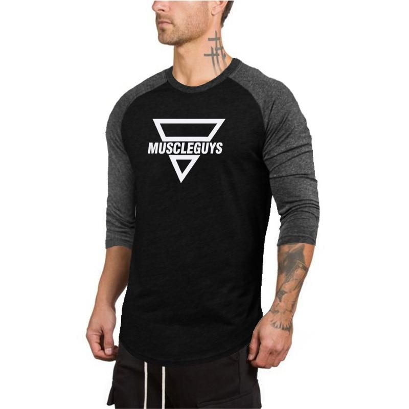 Muscleguys Nowa męska koszulka sportowa na co dzień wczesną jesienią, miękka, przyjazna dla skóry, szyta koszulka z graficznym rękawem o trzech czwartych