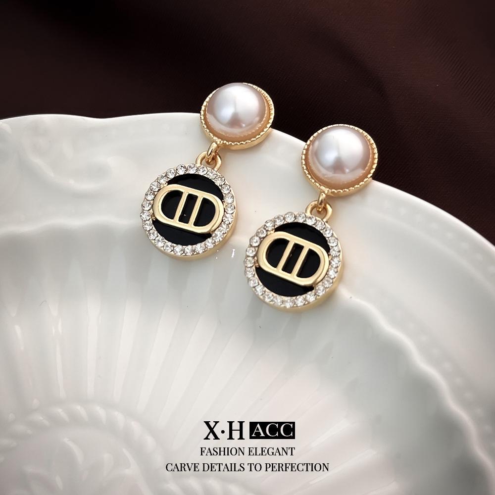 Elegant Gold-Plated Black Zircon Stud Earrings - Niche Design for a Luxurious Fashion Statement