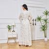 Women's Evening Gown: Stylish Long Dress Featuring Textured Floral Patterns and Gold Foil Accents