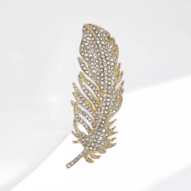 

Темперамент Полный бриллиант Перо Брошь Женская атмосфера Изысканная брошь Простая модная булавка Ретро костюм Аксессуары