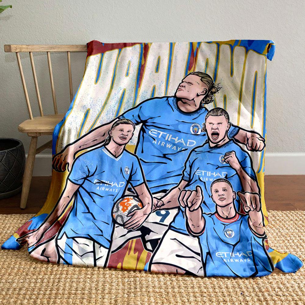 Group of athletes in blue jerseys with bold text and vibrant backdrop. for all seasons blanket lunch break throw gift