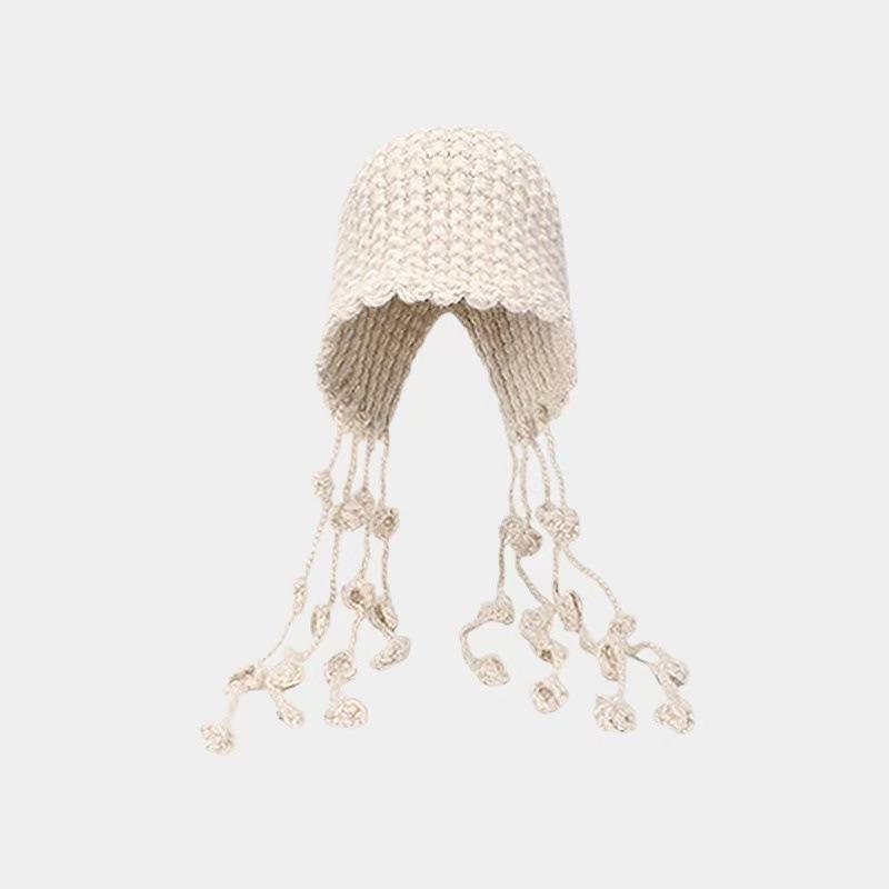 Autumn and winter hand-woven hollowed-out bald hat Warm wool hat Women's fringed ear protector Knitted hat