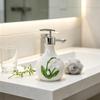 Sink Side Soap Pump Bottle with White Body and Flower Pattern for Bathroom Sink Use, Guest Bath Placement, and Hand Wash Bottle Access