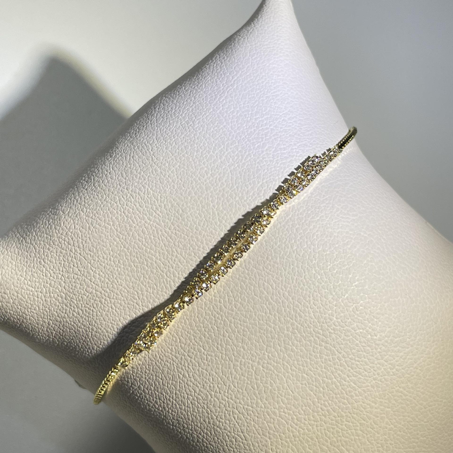 

Женский элитный браслет с двойным рядом циркониевых бриллиантов и перекрестным дизайном