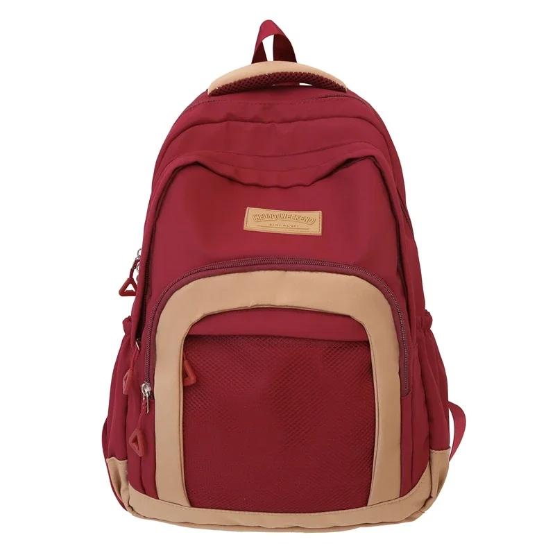 

Monochromatic nylon backpacks with a zippered inner pocket for women high-quality softback casual bags