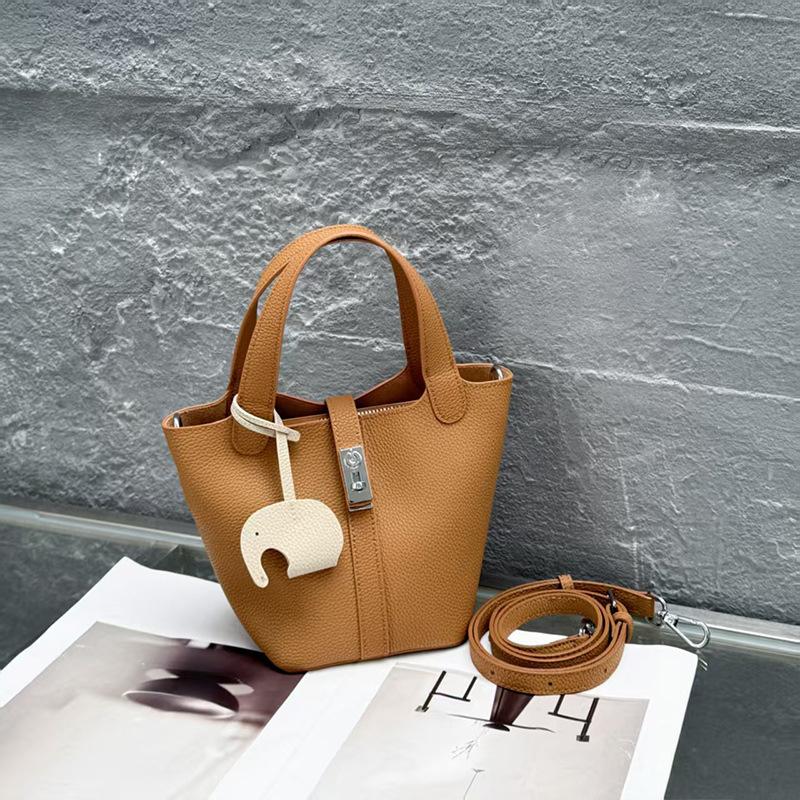 

New Genuine Leather Women s Bag Niche Korean Version Versatile Top Layer Togo Cowhide Women s Handbag Single Shoulder Lock Buckle Basket Bag Bag Opening24Sole length1 золотий коричневий колір