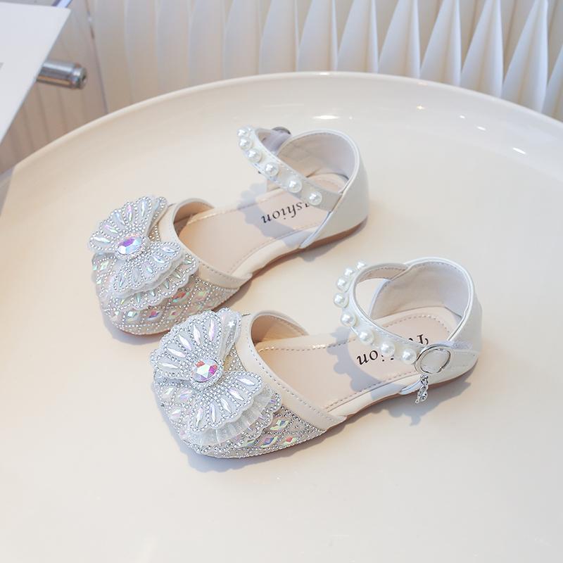 

Полубосоножки для девочек, блестящие хрустальные детские туфли принцессы на лето 2025, новая пляжная обувь для девочек, модные милые банты, хрустальные мягкие 23 бежевый