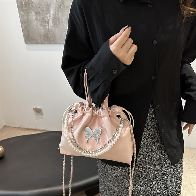 Längliche schmetterlingsförmige feminine Tasche Premium-Tasche ausländischer Stil Perlenkette vielseitig Frühling und Sommer neu