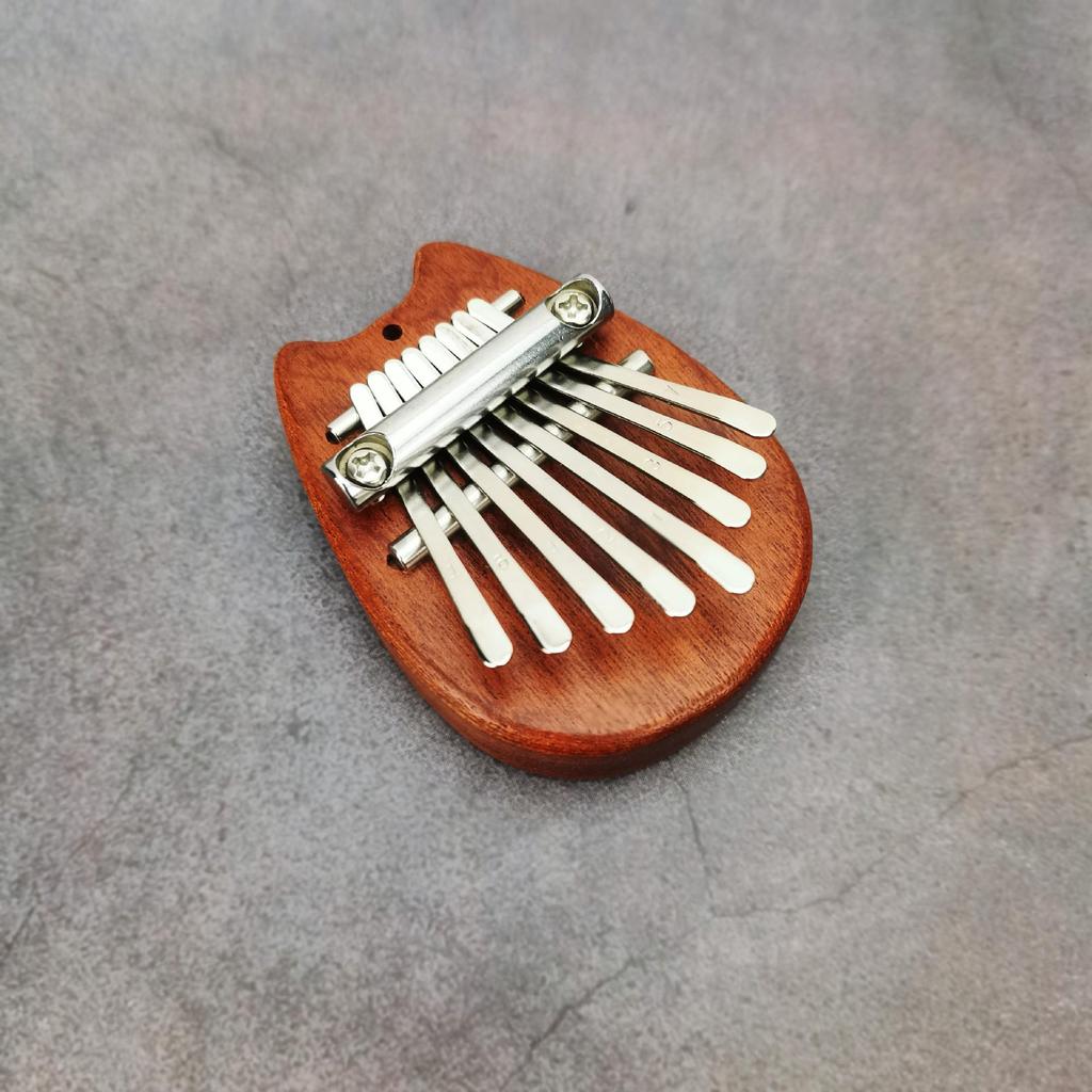 Tragbares 8-Noten Mini Kristallklares Daumenklavier für Anfänger