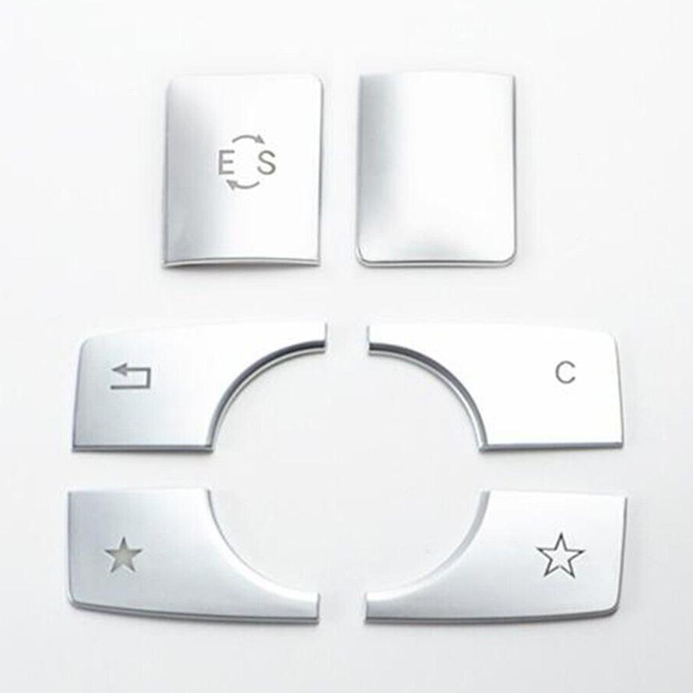 Dodaj odrobinę elegancji do wnętrza Twojego samochodu dzięki listwom nakładkom na przyciski konsoli środkowej dla Mercedesa Klasy E W212