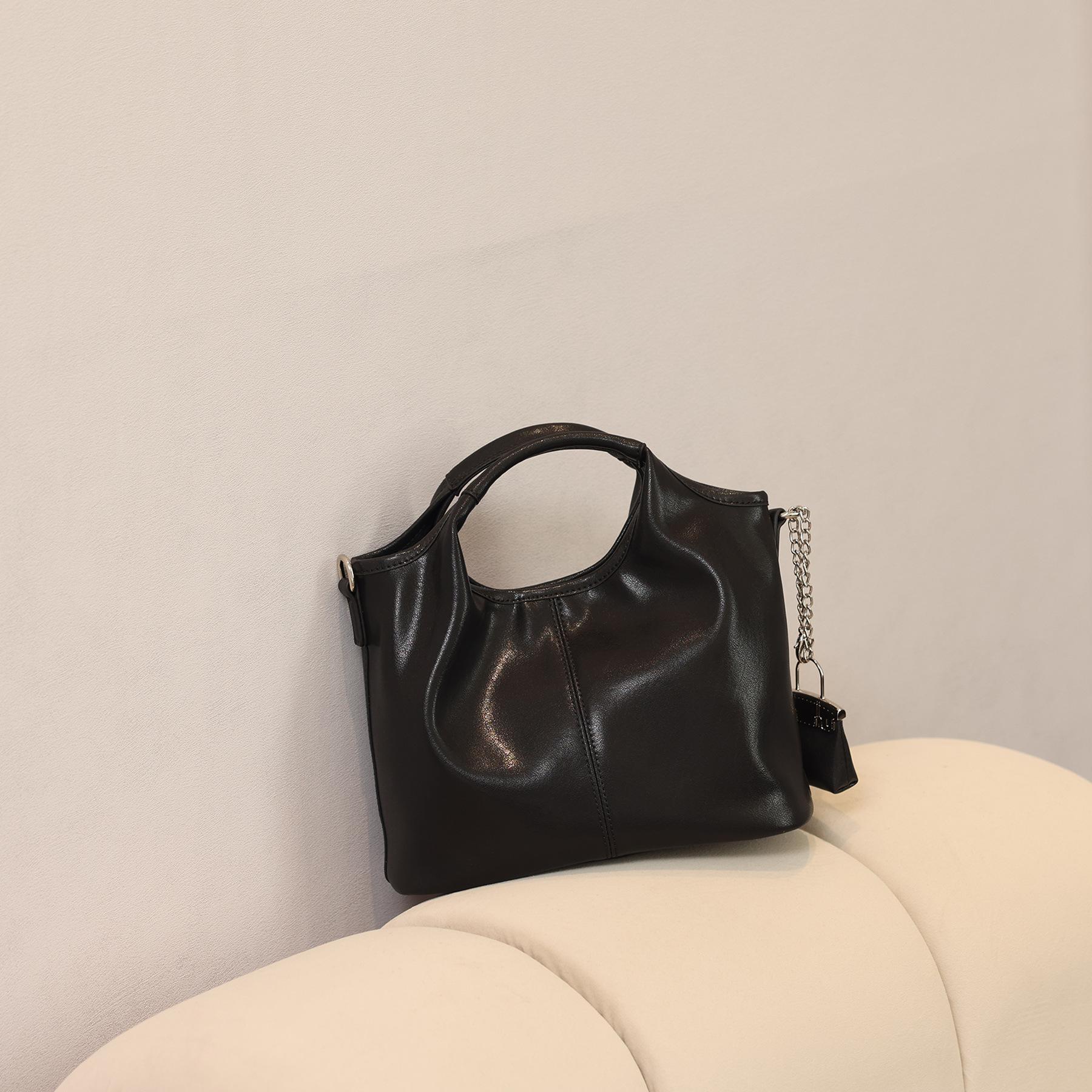 

Bucket bag 2025 spring/summer new fashion retro handbag niche high-end genuine leather shoulder and crossbody women s bag чёрный