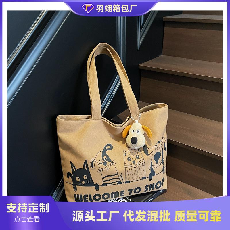 Casual large-capacity canvas bag women's new lightweight and versatile commuter shoulder bag portable tote bag