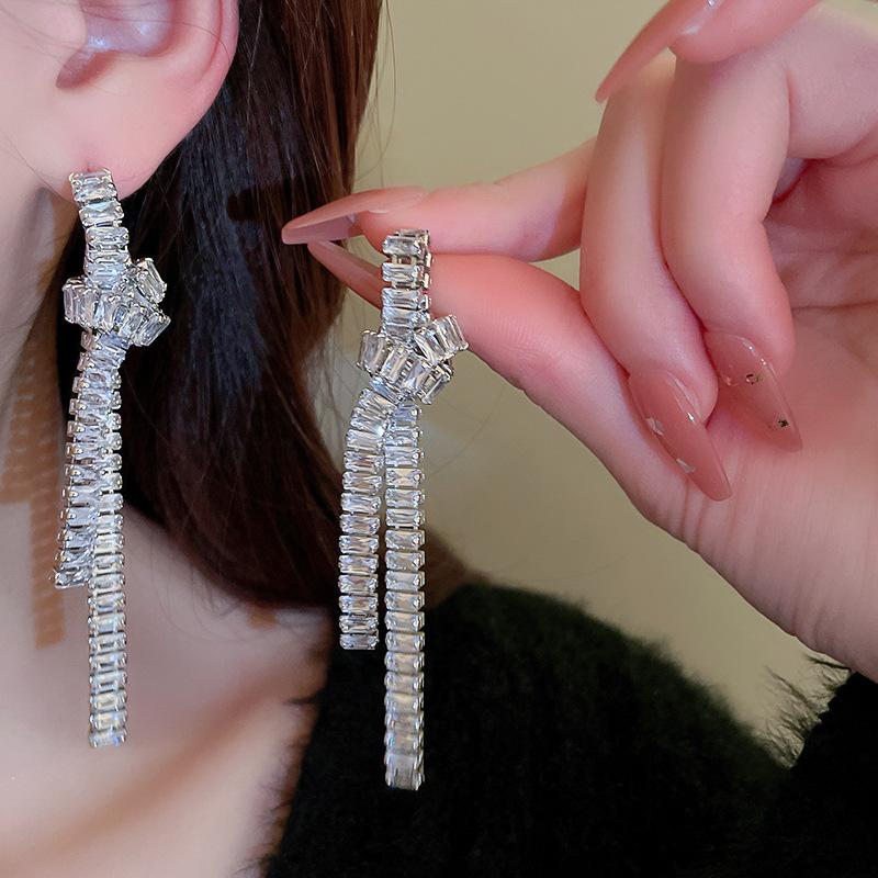 Zircon knotted long tassel silver needle earrings Korean niche elegant light luxury earrings 