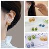 Fresh and elegant crystal earrings in orange, sea blue and green pastel gradient colors. Women's light luxury and fashionable earrings.