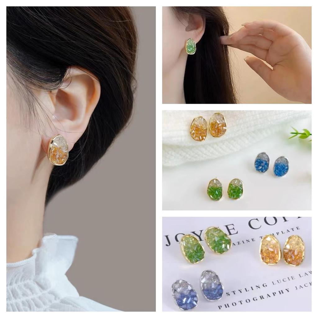 Fresh and elegant crystal earrings in orange, sea blue and green pastel gradient colors. Women's light luxury and fashionable earrings.