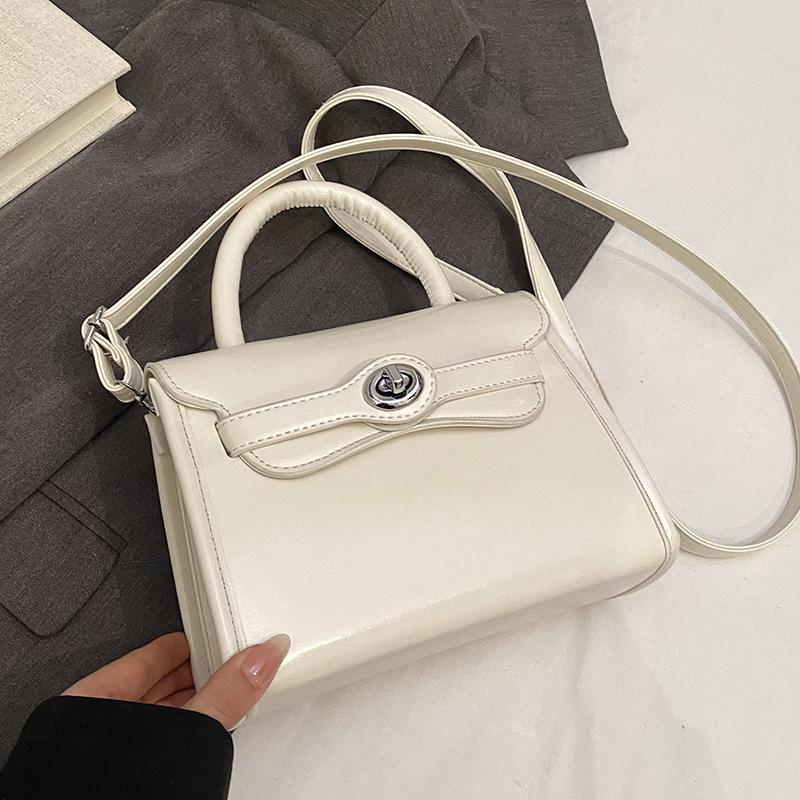 Fashion New French Simple Style High-end Sense Portable Small Square Bag Casual Versatile Commuter Solid Color PU Messenger Bag Women