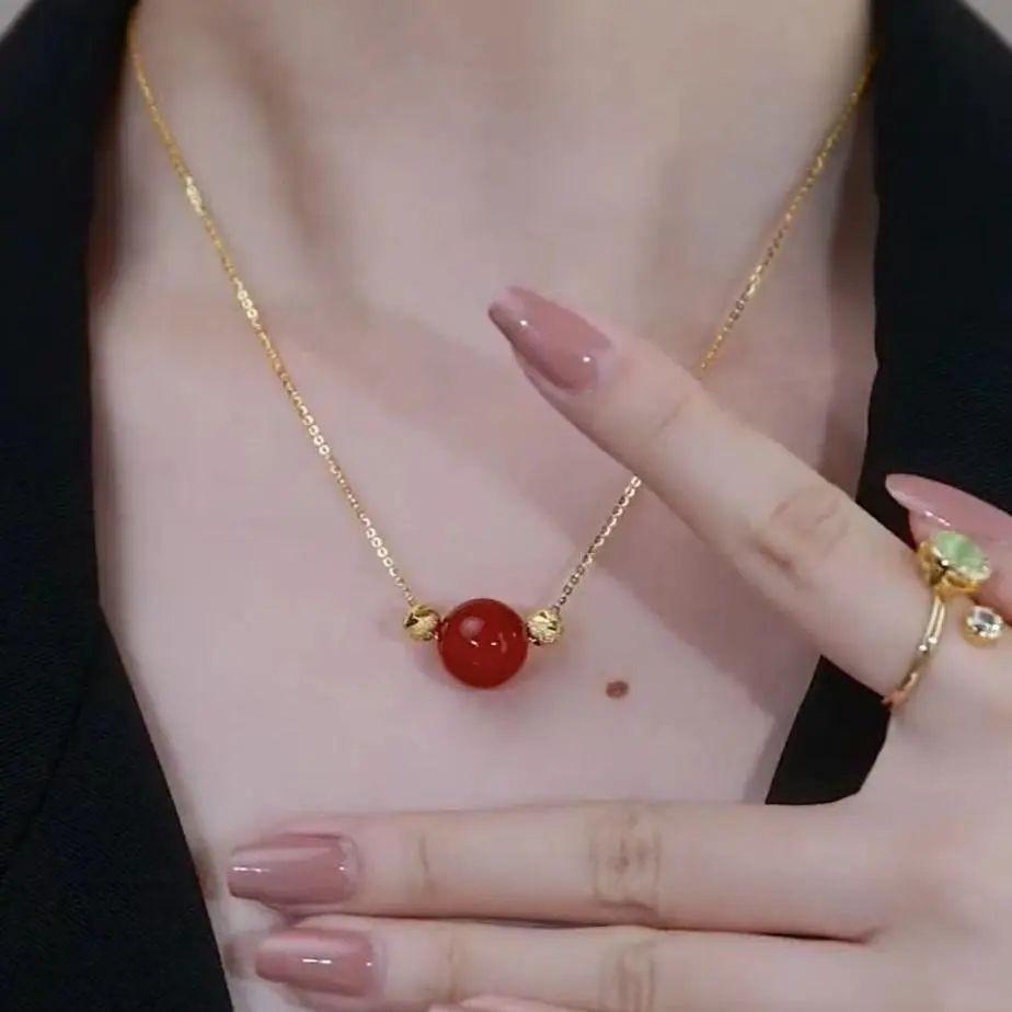 

Red agate decoration necklace women s light luxury niche high-end collarbone chain temperament acacia bean accessory design