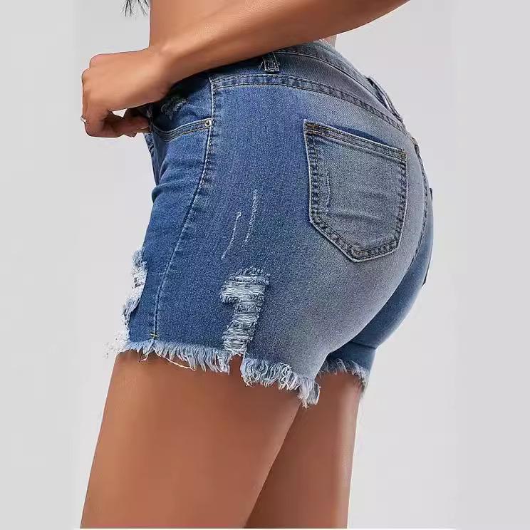 Damen-Denim-Shorts mit zerrissenen Löchern und Quasten