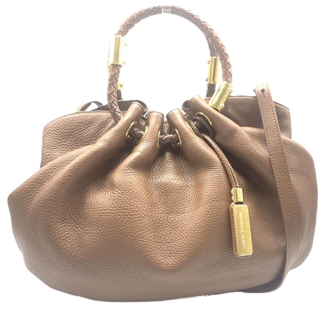 Б/у Женская кожаная сумка Michael Kors