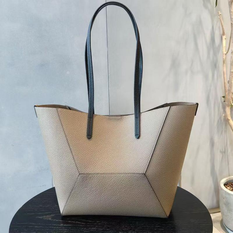 

Genuine leather women s bag, top layer cowhide single-shoulder bag, color-blocking and patchwork geometric bag, handbag, high-end mother-and-child bag 28x15x27cm сірий