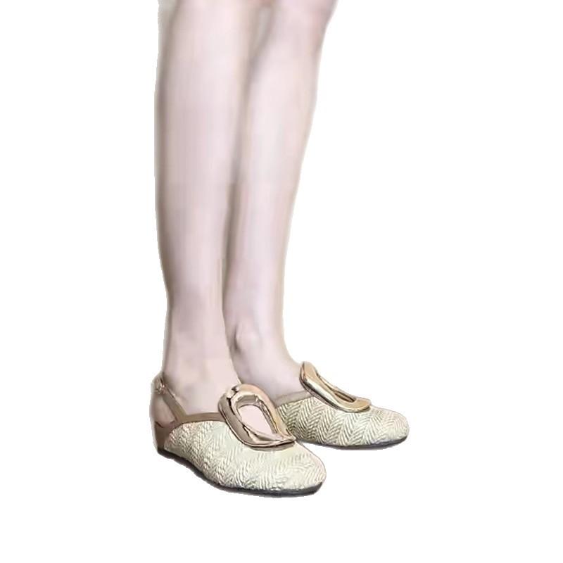 Sheepskin version~ niche personalized design sense straw woven vacation wind bag head shoes women's rear strap hollow wedge half slippers