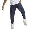 adidas Essentials M Sl C 7/8 Kalhoty Ležérní Střih Střední Pas Jednobarevné Zúžené Tkané Kalhoty Pánské Kalhoty Legend-Ink HA4349