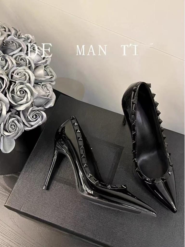 Spring and summer new rivet pointed high heels women's thin heel leather black patent leather OL nightclub super high heel single shoes