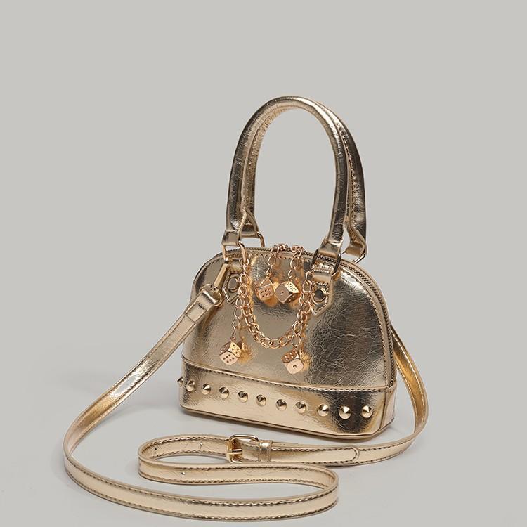 Niche high-end champagne gold shell bag daughter handbag 2025 new versatile commuter shoulder crossbody bag